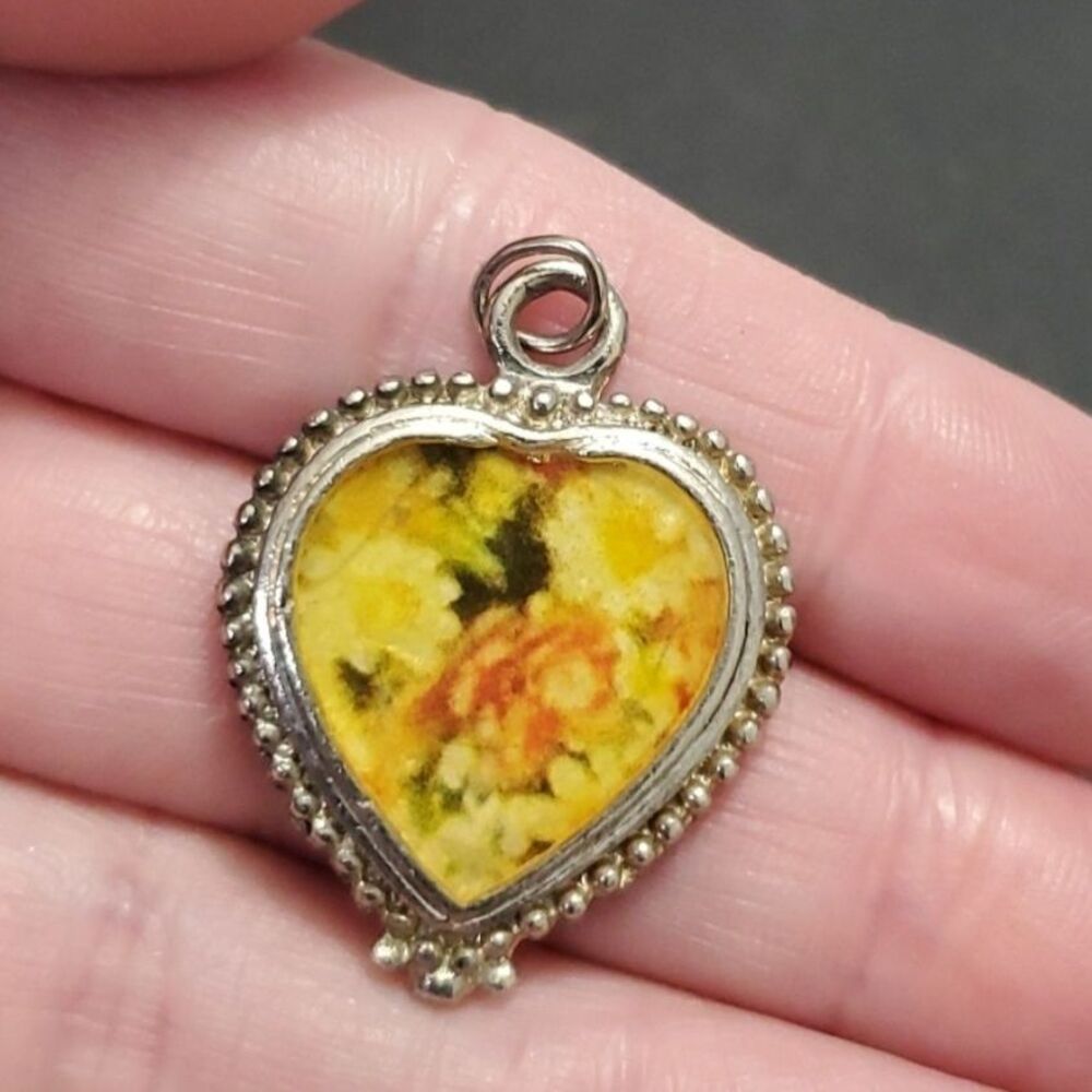 Vintage silver tone floral heart pendant